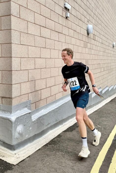 Simon sprinting around the shopping centre
